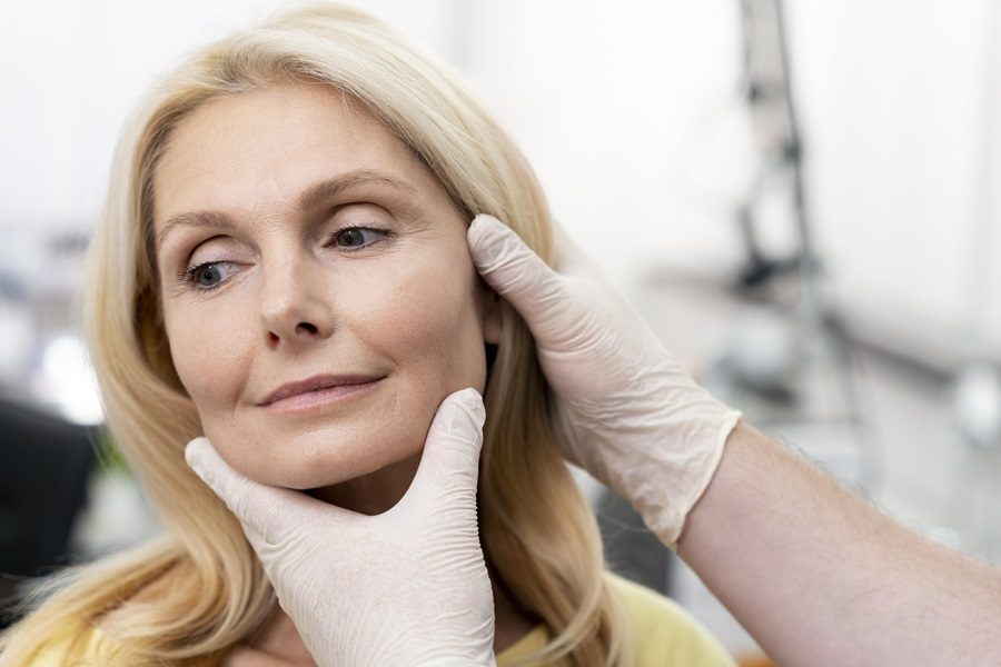 patient receiving a consultation at a cosmetic clinic.