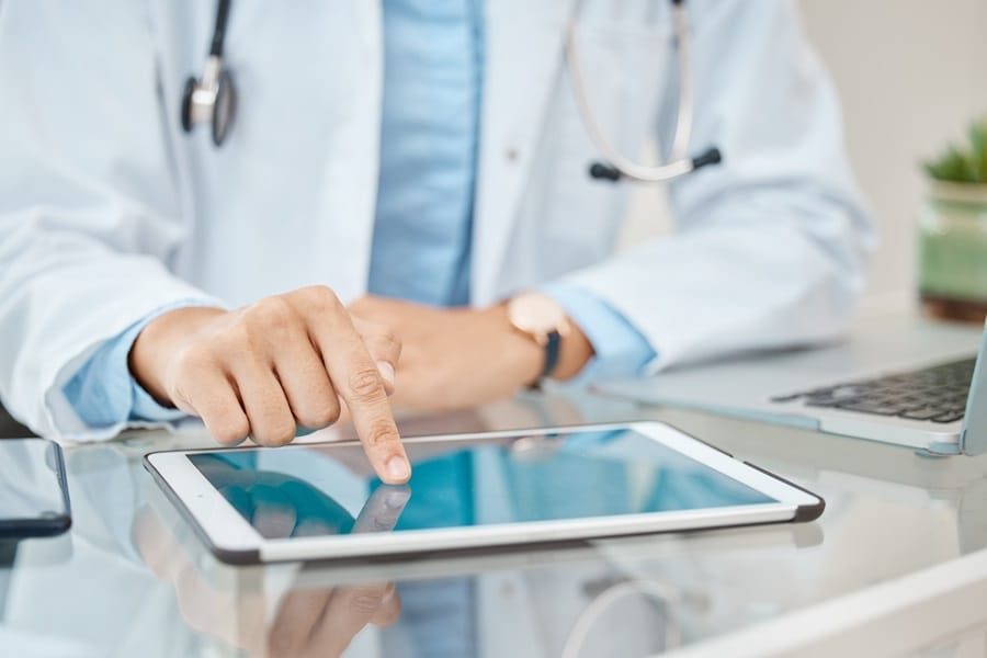 Healthcare, medical and digital worker with technology and medicine telemarketing