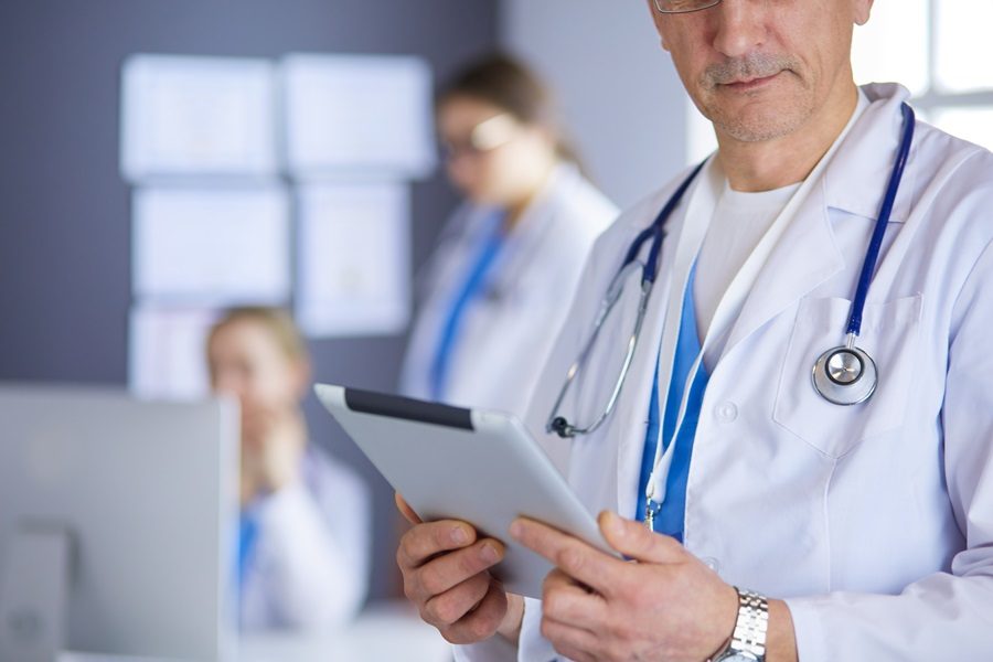 Medicine doctor working with modern tablet computer